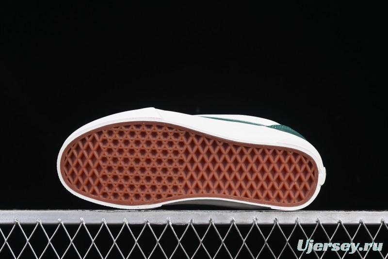 Classic Green Suede Skate Shoes with Signature Wave Design