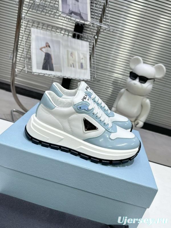 2025 Women Prada Light Blue White Leather Sneakers KFY00310