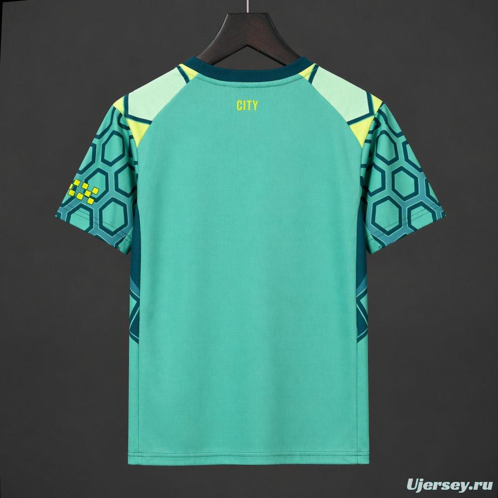 26/27 Manchester City Vibrant Green Goalkeeper Jersey With Dark Blue Geometric Pattern.